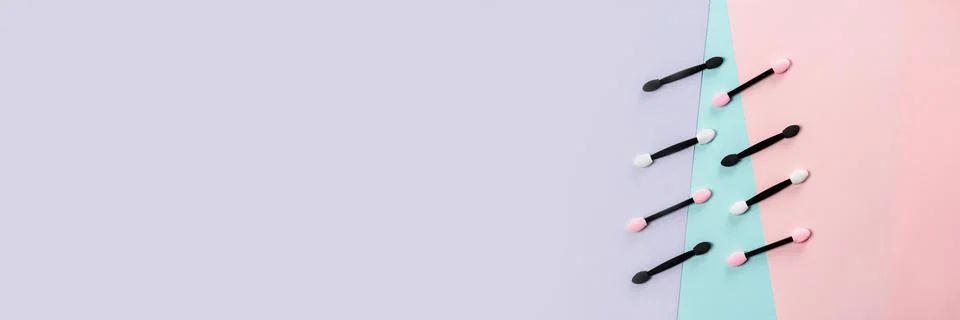 Set of applicators for applying shadows on multicolored background. Banner. Foto stock