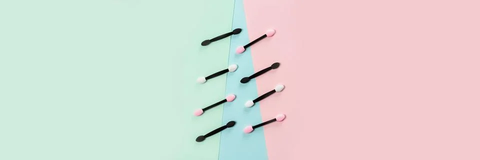 Set of applicators for applying shadows on multicolored background. Banner. Stock Photos