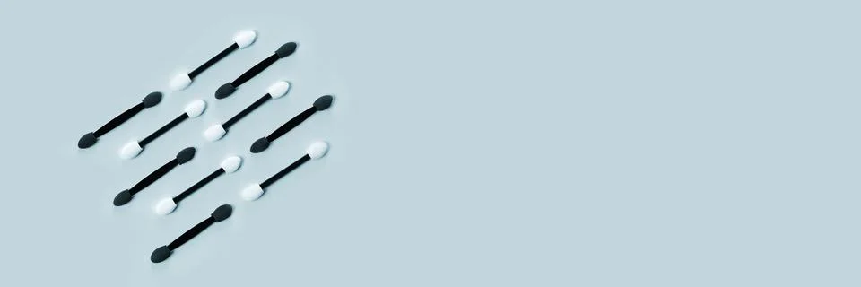 Set of applicators for shadows on blue background. Banner. Stock Photos