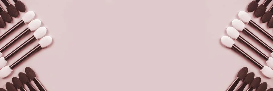 Set of applicators for shadows on red background. Banner. Toned. Stock Photos