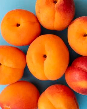 Set of apricots placed in the shape of a flower Stock Photos