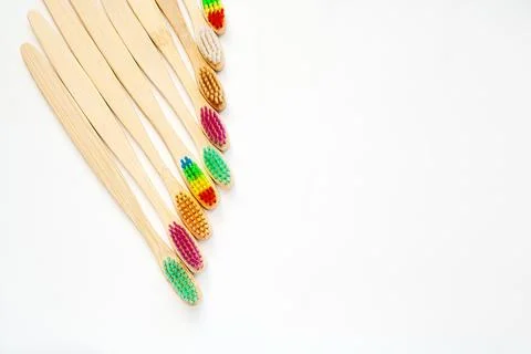 Set with bamboo toothbrushes on white background Stock Photos