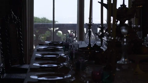 Set banquet table in dark room Stock Footage 100461338