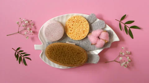Set of bathroom accessries on the pink background. Beauty care concept Stock Footage 151227556