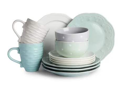 Set of beautiful ceramic dishware isolated on white Stock Photos