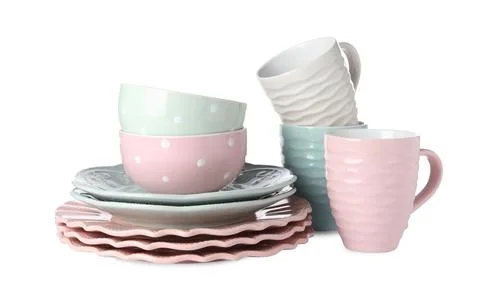 Set of beautiful ceramic dishware isolated on white Stock Photos