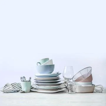 Set of beautiful kitchenware on a bules background Stock Photos