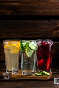 Set of beautiful summer refreshing drinks on a wooden background. still life  Stock Photos