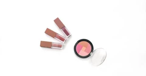 Set of beauty cosmetics tools make up; lipsticks, eye shadow palette, blush Stock Photos