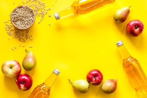 Set of beer bottles with apple, pears, wheat from above Stock Photos