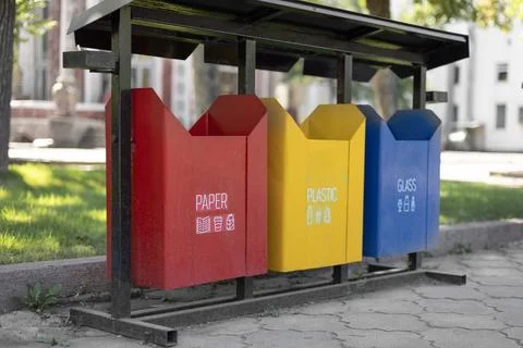 Set of bins for the selective collection of waste (glass, paper,  plastic) .. Stock Photos