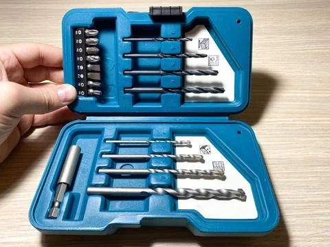 A set of bits and drills for wood, metal and brick in a beautiful box Stock Photos