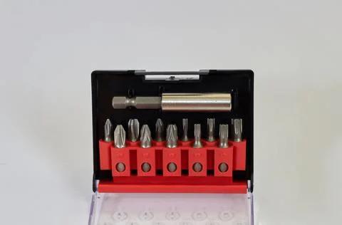 A set of bits for screwing screws with a drill, a screwdriver Stock Photos