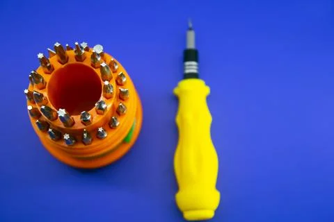 A set of bits for screwing screws with a drill Stock Photos