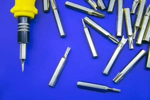 A set of bits for screwing screws with a drill Stock Photos