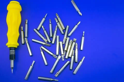A set of bits for screwing screws with a drill Stock Photos