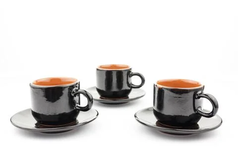 Set of black earthenware cups Stock Photos