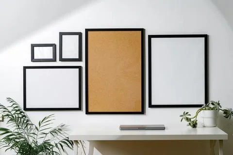 Set of black frames on white wall with copy space Stock Photos