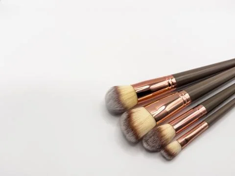 A set of black makeup brushes isolated cutout on white background, copy space Stock-Fotos