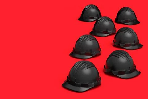 Set of black safety helmets or hard caps isolated on red background Stock Illustration