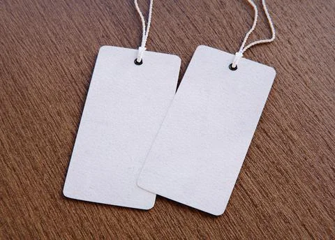 Set of blank tags tied with a string. Price tag, gift tag, sale tag. Stock Photos