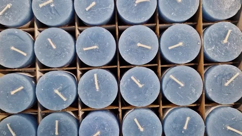 Set of blue candles in a box, aromatherapy, household goods Stock Footage 250274013
