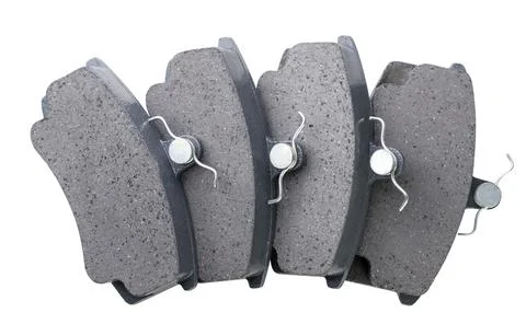 Set of brake pads on a white background. Top view Stock Photos