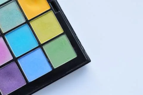 Set of bright multi color eye shadows isolated on white background. Stock Photos