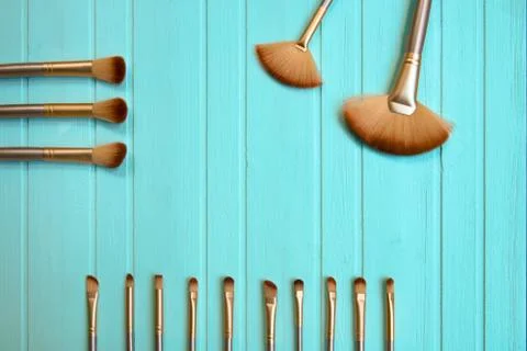 Set of brushes on a blue background Stock Photos