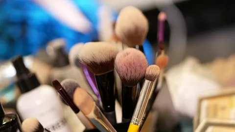 Set of brushes for make-up on table in dressing room. Fashion industry. Fashion  Video stock 152036292