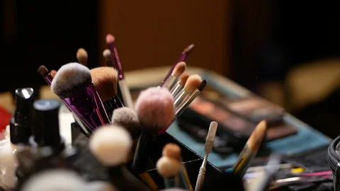 Set of brushes for make-up on table in dressing room. Fashion industry. Fashion  Video stock 152036409