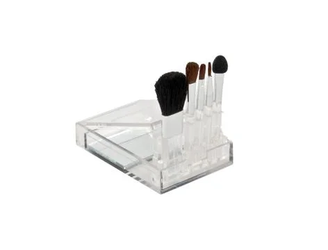 Set of brushes for makeup in a transparent box Stock Photos