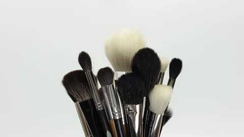 Set of brushes rotate on a white background. Stock Footage 127614163