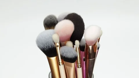 Set of brushes rotate on a white background. Stock Footage 127614175