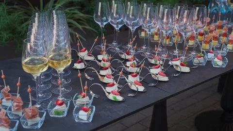 A set buffet table at a celebration, slow motion camera movement Stock Footage 329093563