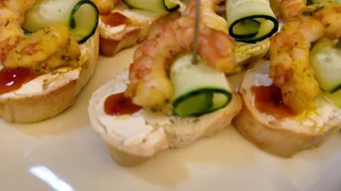 A set buffet table at a celebration, slow-motion camera movement, all sorts of Vídeo Stock 329093665