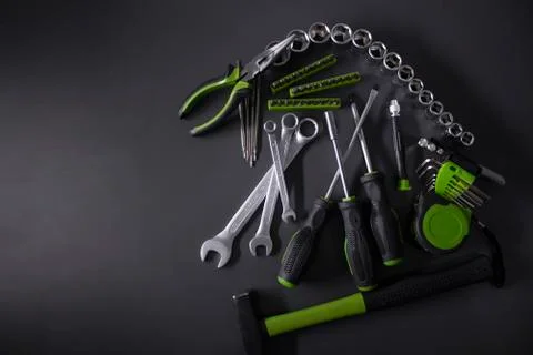 A set of building tools and instruments for repair in black and green colour Fotos de archivo