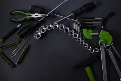 A set of building tools and instruments for repair in black and green colour Fotos de archivo