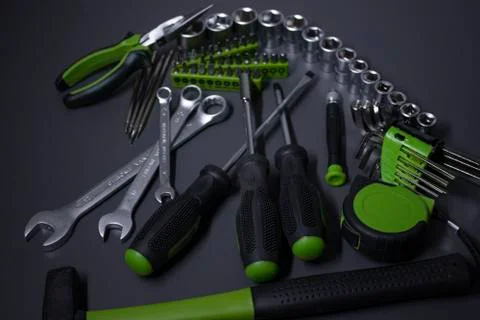 A set of building tools and instruments for repair in black and green colour Fotos de archivo