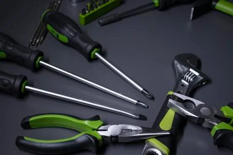A set of building tools and instruments for repair in black and green colour Fotos de archivo