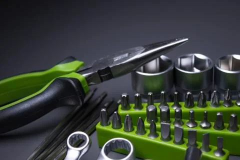 A set of building tools and instruments for repair in black and green colour Fotos de archivo