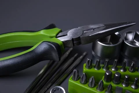A set of building tools and instruments for repair in black and green colour Fotos de archivo