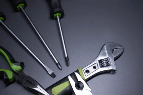 A set of building tools and instruments for repair in black and green colour Fotos de archivo
