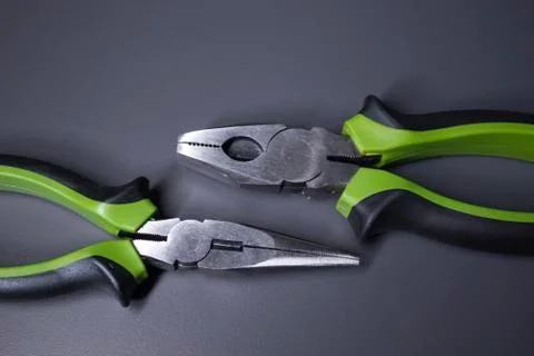 A set of building tools and instruments for repair in black and green colour Fotos de archivo