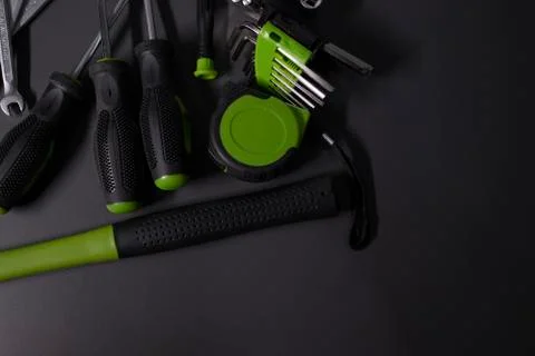 A set of building tools and instruments for repair in black and green colour Fotos de archivo