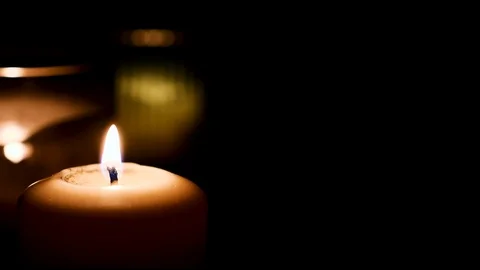 Set of candles burning with dark background. Fire Wick at black environment Stock Footage 127283833