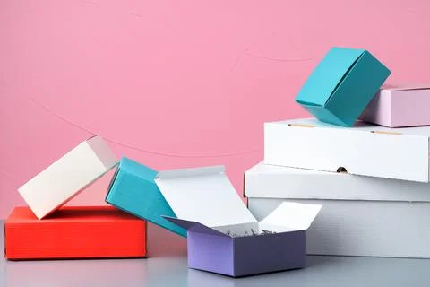 Set of cardboard boxes on pink background Stock Photos