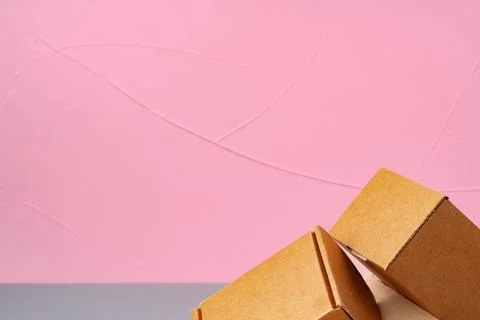 Set of cardboard boxes on pink background Stock Photos