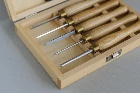 Set of carpenter tools in box on the table Stock Photos