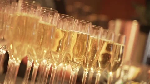 The set of champagne glasses. The close-up view of champagne glasses. Wedding 動画素材 171995432